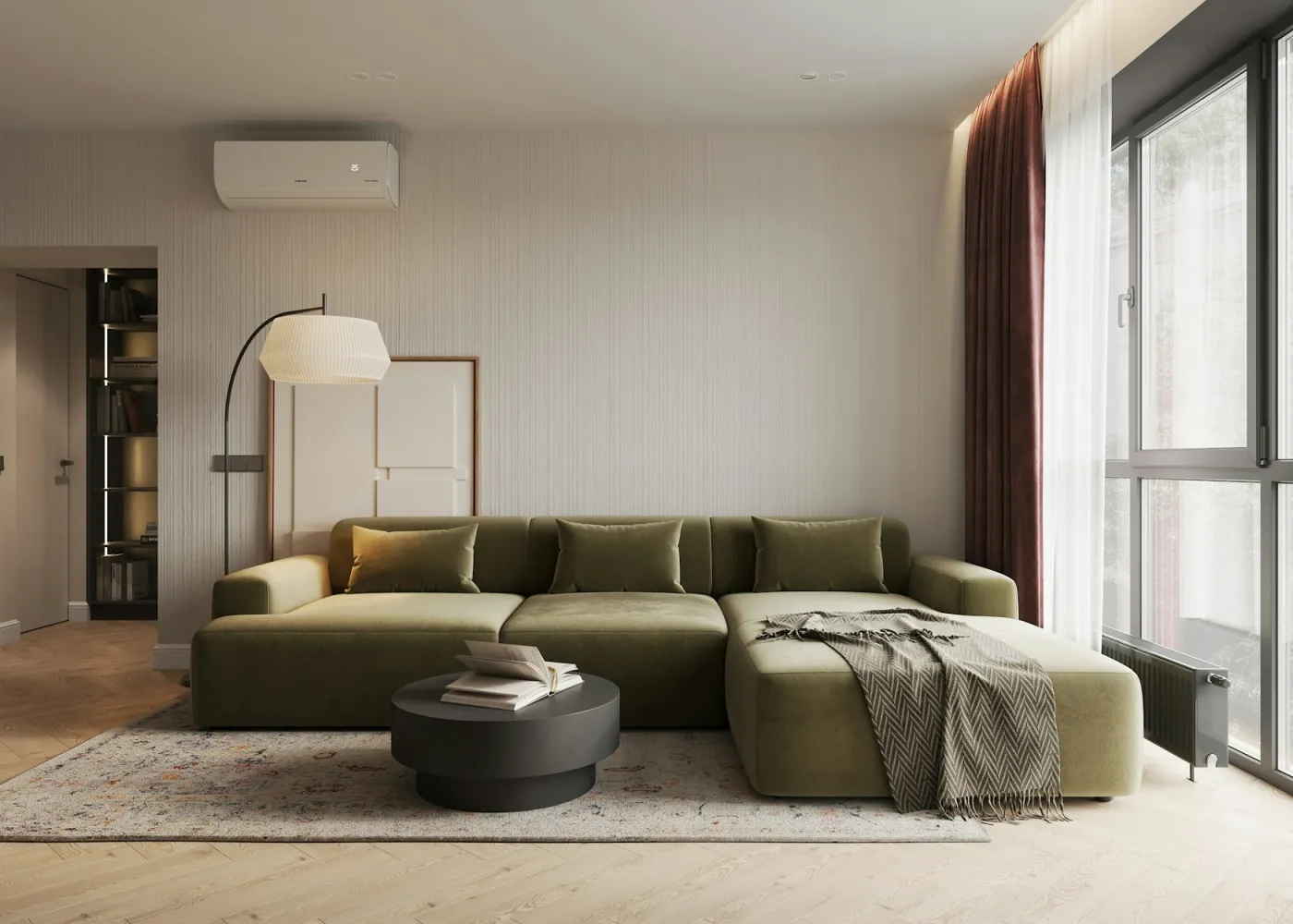 A living room with a green sofa